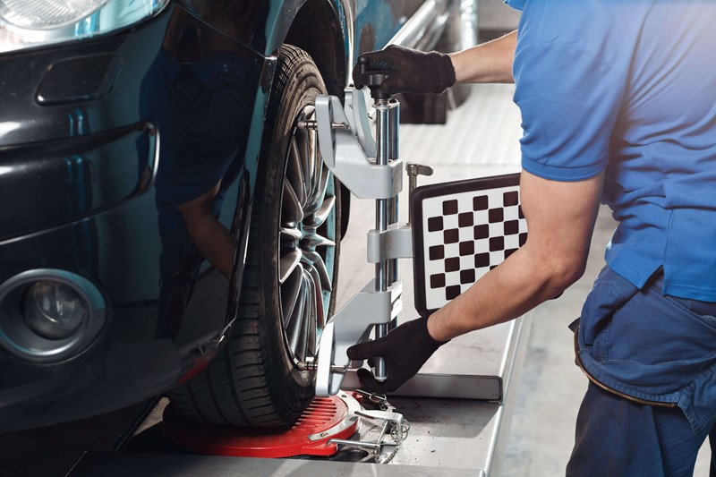 First Stop Mechanic balancing a tyre on a machine