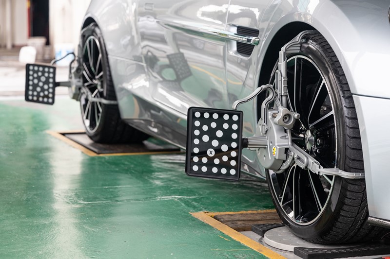 First Stop performing 4 wheel alignment