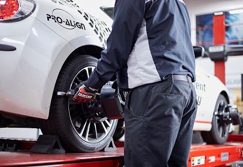 First Stop Technician performaing a wheel alignment